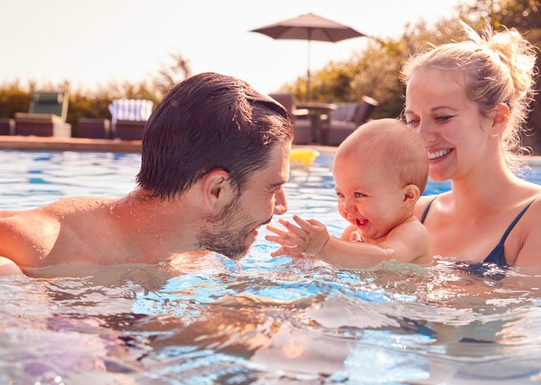 Healthy pool family swimming
